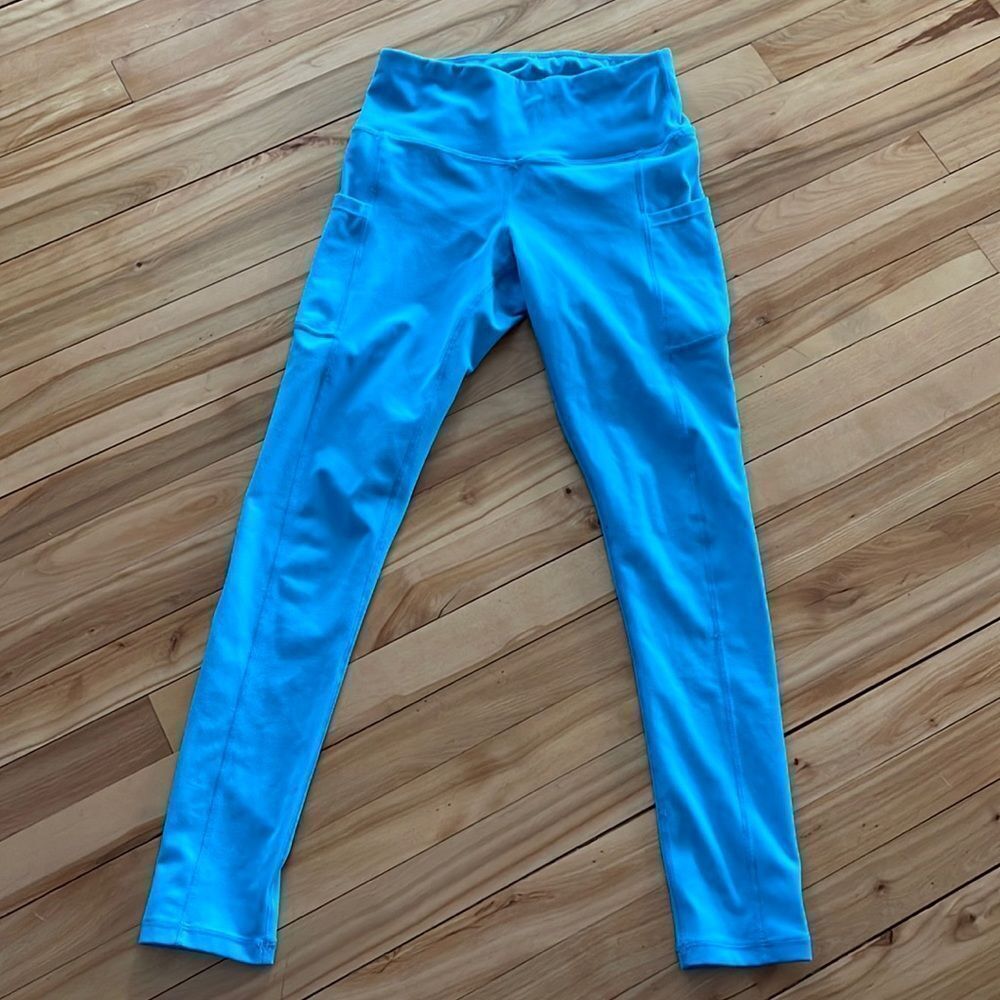 iuga light teal high waisted side hip pocket leggings. Small.